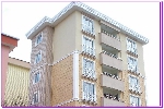 Отделка фасада многоэтажных домов Изосайдингом, с применением декоративных элементов из Изосайдинга