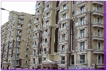 Отделка фасада многоэтажных домов Изосайдингом, с применением декоративных элементов из Изосайдинга вид с лева