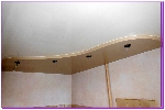 Двухуровневый натяжной потолок в кухне чайка